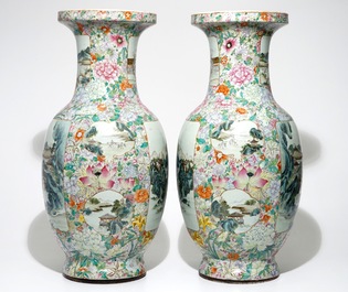 A large pair of Chinese famille rose millefleurs vases with landscape panels, Qianlong mark, 19th C.