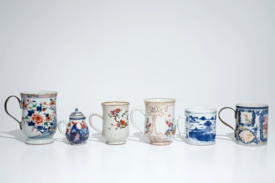 Five Chinese famille rose and blue and white mugs and a covered jug, mostly Qianlong