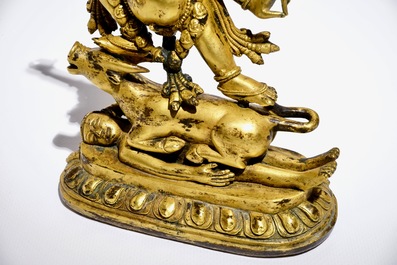 A Tibetan gilt bronze figure of Yama Dharmaraja, 18th C.