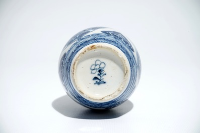 A Chinese blue and white barrel-shaped flask with floral design, Kangxi