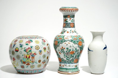 Three various Chinese famille rose, verte and blue and white vases, 19th C.