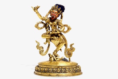 A Tibetan gilt bronze figure of Simhavaktra, 18th C.