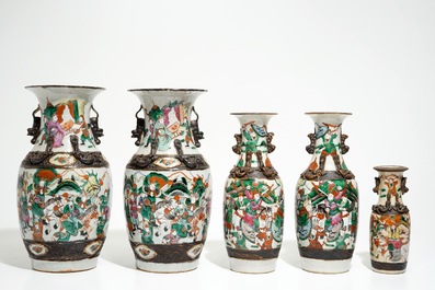 Two pairs of Chinese Nanking famille rose vases and a smaller one, 19/20th C.
