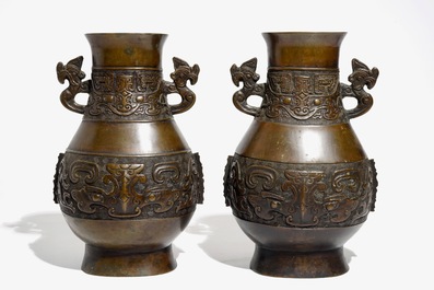 A pair of Chinese bronze hu vases in archaic style, 19th C.