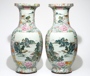 A large pair of Chinese famille rose millefleurs vases with landscape panels, Qianlong mark, 19th C.