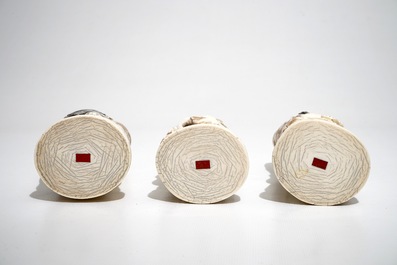 Three signed Japanese ivory okimono of bearded sages, Meiji, early 20th C.