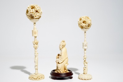 Two Chinese Canton ivory puzzle balls on stands and a figure of a sage, 19th C.