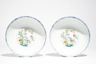 A pair of Chinese doucai bowls with floral famille rose medallions, 4-character mark, 19/20th C.