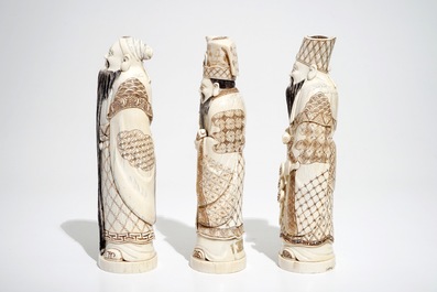 Three signed Japanese ivory okimono of bearded sages, Meiji, early 20th C.