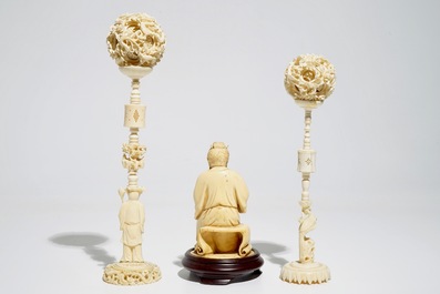 Two Chinese Canton ivory puzzle balls on stands and a figure of a sage, 19th C.