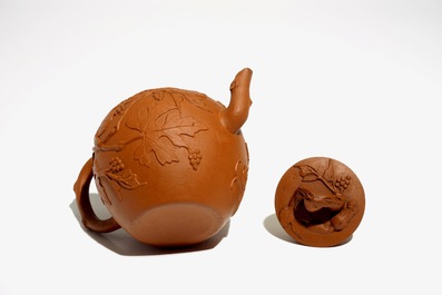 A Chinese Yixing teapot with applied squirrels and vines, Kangxi