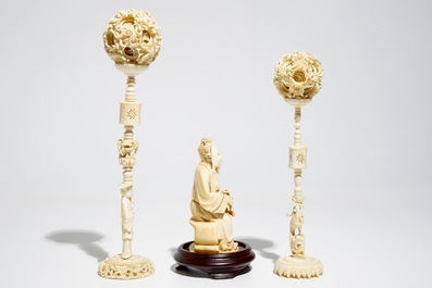 Two Chinese Canton ivory puzzle balls on stands and a figure of a sage, 19th C.