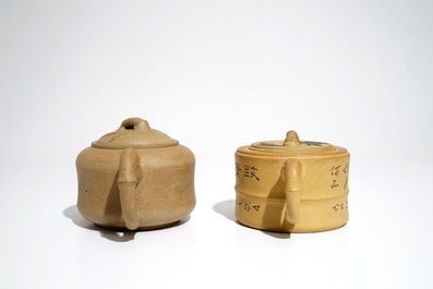 Two Chinese sand-coloured Yixing stoneware teapots, 20th C.