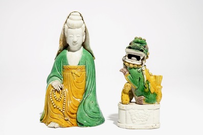 A Chinese verte biscuit Guanyin and a Buddist lion joss stick holder, Kangxi