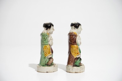 A pair of Chinese verte biscuit models of Liu Hai with the toad, Kangxi