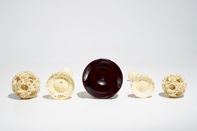 Two Chinese Canton ivory puzzle balls on stands and a figure of a sage, 19th C.