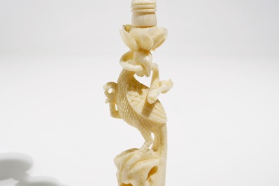 Two Chinese Canton ivory puzzle balls on stands and a figure of a sage, 19th C.