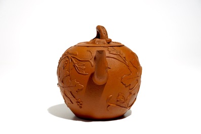 A Chinese Yixing teapot with applied squirrels and vines, Kangxi