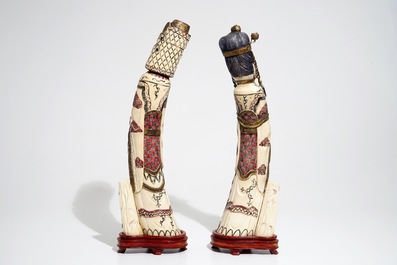 A pair of tall Chinese polychrome ivory figures, early 20th C.