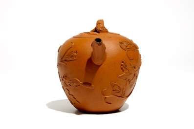 A Chinese Yixing teapot with applied vines, Kangxi