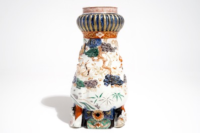 A Japanese Imari coffee jug with applied design, Edo, late 17th C.