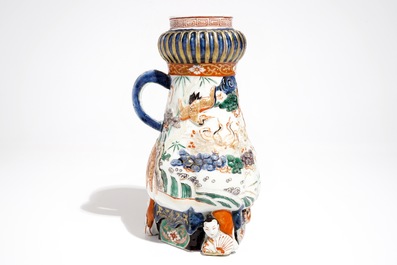 A Japanese Imari coffee jug with applied design, Edo, late 17th C.