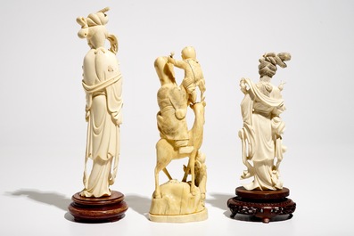 Two Chinese carved ivory figures of Guanyin and a Japanese okimono, 19/20th C.