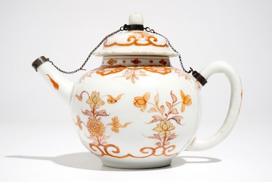 A Chinese milk and blood teapot on stand, Kangxi