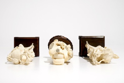 Three Chinese ivory figures on wooden bases, 1st half 20th C.