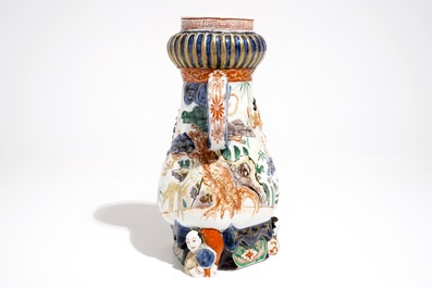 A Japanese Imari coffee jug with applied design, Edo, late 17th C.