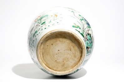 A Chinese famille verte fish bowl with a phoenix and mandarin ducks, 19th C.