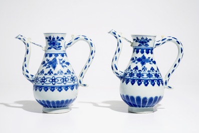 A pair of Chinese blue and white ewers, Transitional period