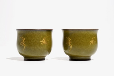 A pair of Chinese teadust-glazed and gilt wine cups with bats, Qianlong mark, 20th C.