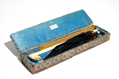 A Chinese folding umbrella with ivory handle, in original box marked Lee Ching, Canton, 19th C.