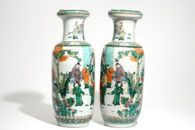 A pair of tall Chinese famille verte vases with court scenes, 19th C.