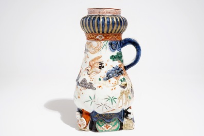 A Japanese Imari coffee jug with applied design, Edo, late 17th C.