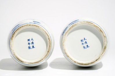 A pair of Chinese blue and white rouleau vases, Kangxi mark, 19/20th C.