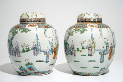 A pair of Chinese famille verte covered jars with figural design, 19th C.