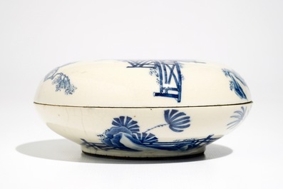 A round Chinese blue and white soft paste box and cover, Kangxi mark, 19th C.