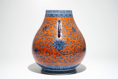 A Chinese coral-ground peony scroll hu vase, Yongzheng mark, 20th C.