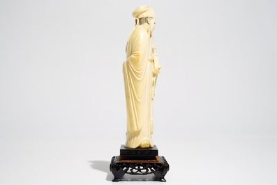 A Chinese ivory figure of a scholar, 19th C.