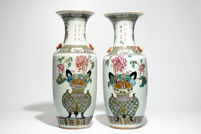 A pair of tall Chinese famille rose vases with incense burners, 19th C.