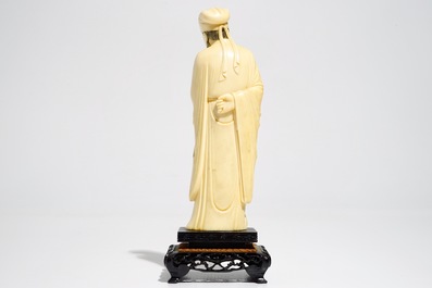 A Chinese ivory figure of a scholar, 19th C.
