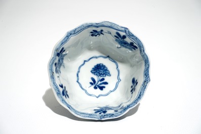 Six Chinese blue and white cups and saucers with floral design, Kangxi