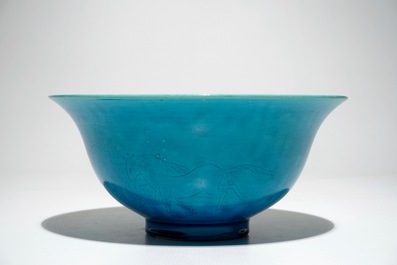 A Chinese monochrome turquoise bowl with incised design of horses, Kangxi mark, 19/20th C.