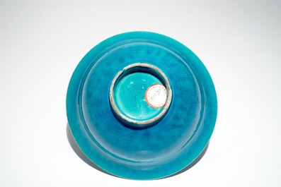 A Chinese monochrome turquoise bowl with incised design of horses, Kangxi mark, 19/20th C.