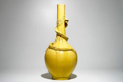 A tall Japanese Awaji monochrome yellow vase with applied dragon, Meiji, ca. 1900