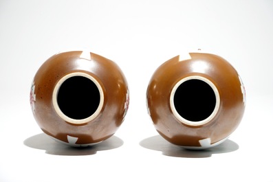 A pair of Chinese Batavian ware famille rose vases, Yongzheng/Qianlong