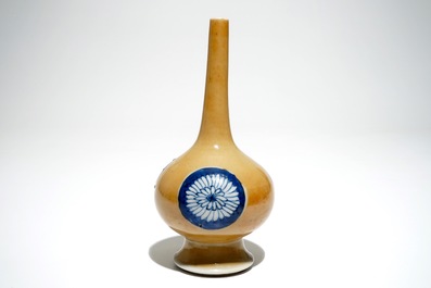 A Chinese blue and white on caf&eacute; au lait-ground sprinkler, Kangxi