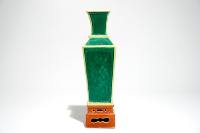 A tapered square Chinese vase on stand in green, yellow and orange, 19/20th C.